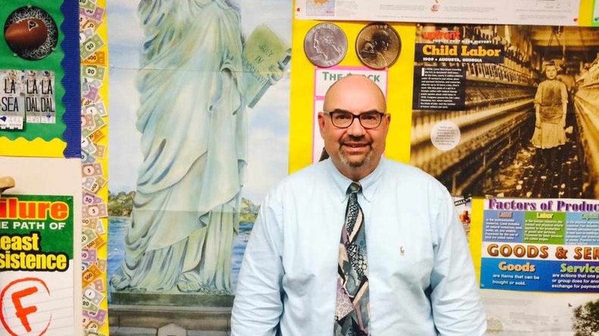 Ron Garcia in his social studies classroom. He’ll teach two fewer classes at Coast Union now that he’s taken over as head football coach and athletic director.
