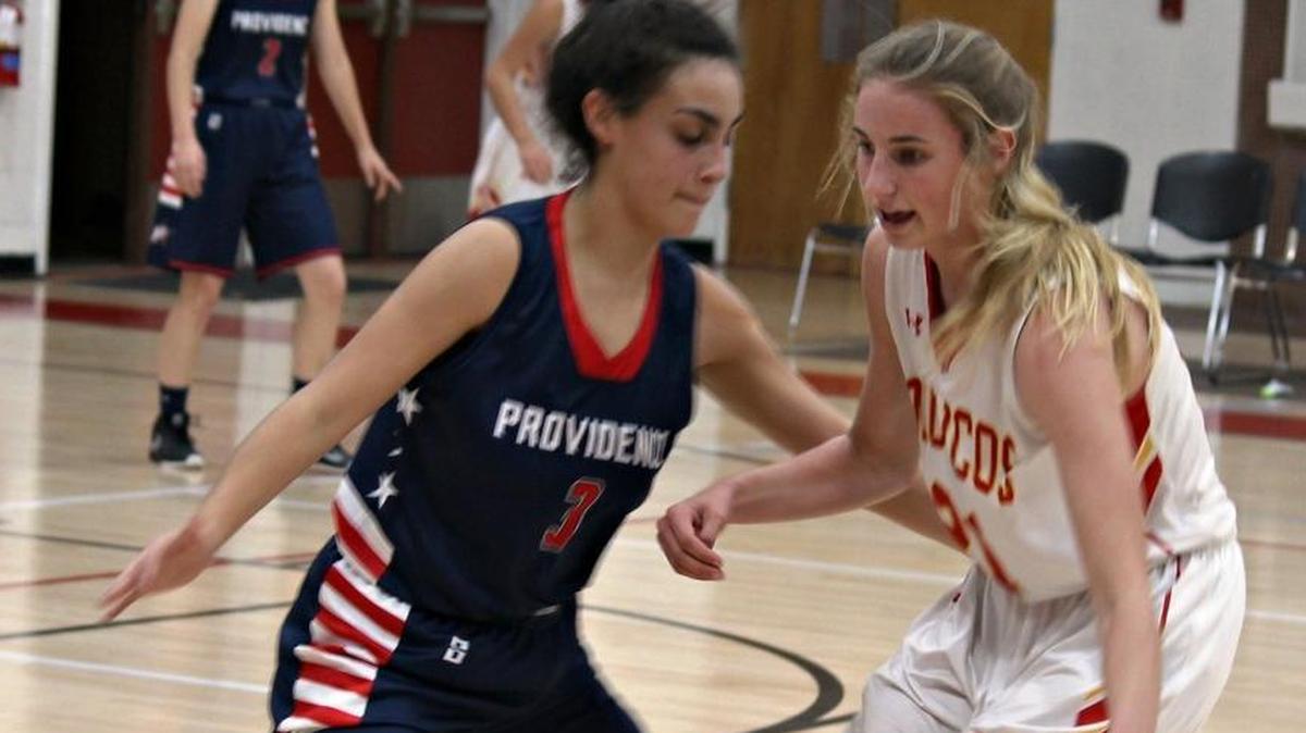 Junior Karis Lawson controls the ball against Providence on Jan. 5. She scored 14 points in Coast Union's 54-44 victory.