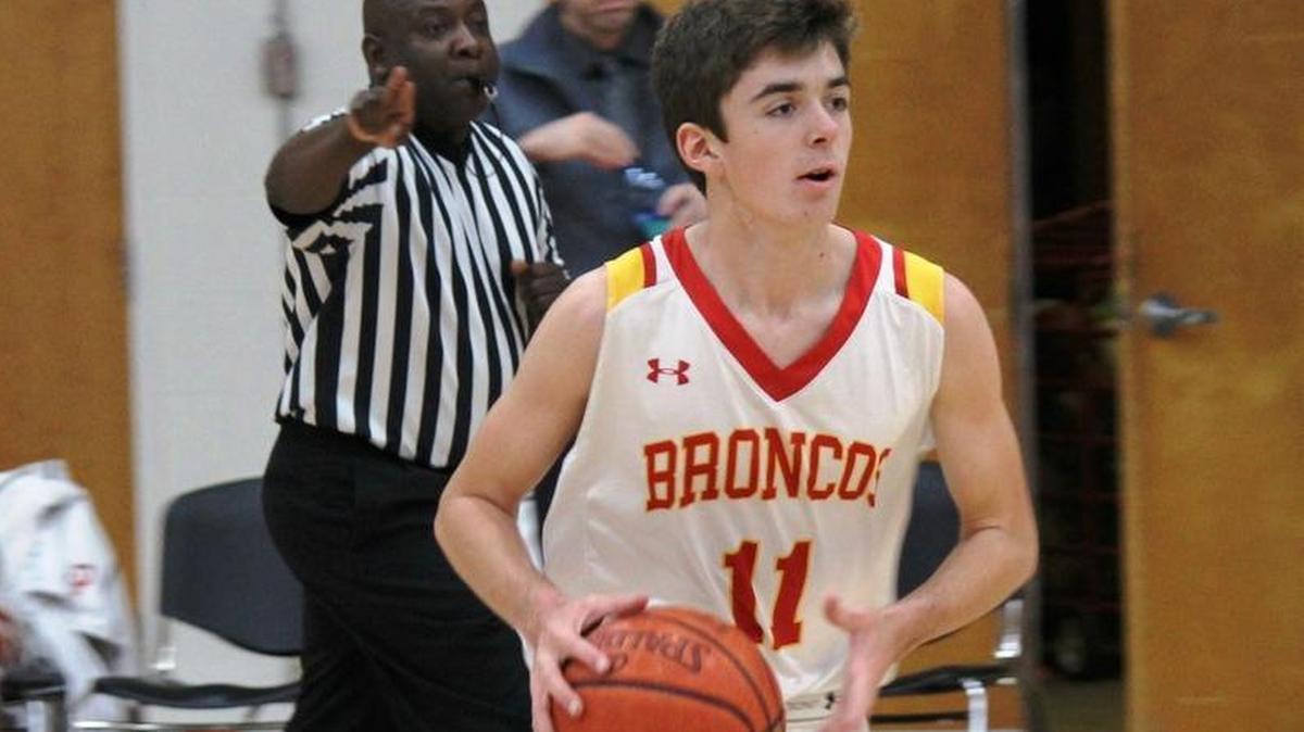 Sophomore Nate Markham scored six points (including key free throws) in the Broncos’ win over Valley Christian Academy on Friday, Jan. 19. Here he controls the ball against Providence earlier in the season.