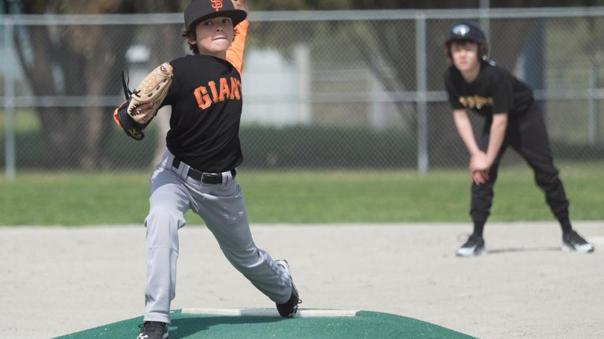 Cambria Giants pitcher Robert Saunders comes to the plate against the Morro Bay Pirates on Saturday, March 19, with a Pirates runner on second. The Pirates won 11-9.