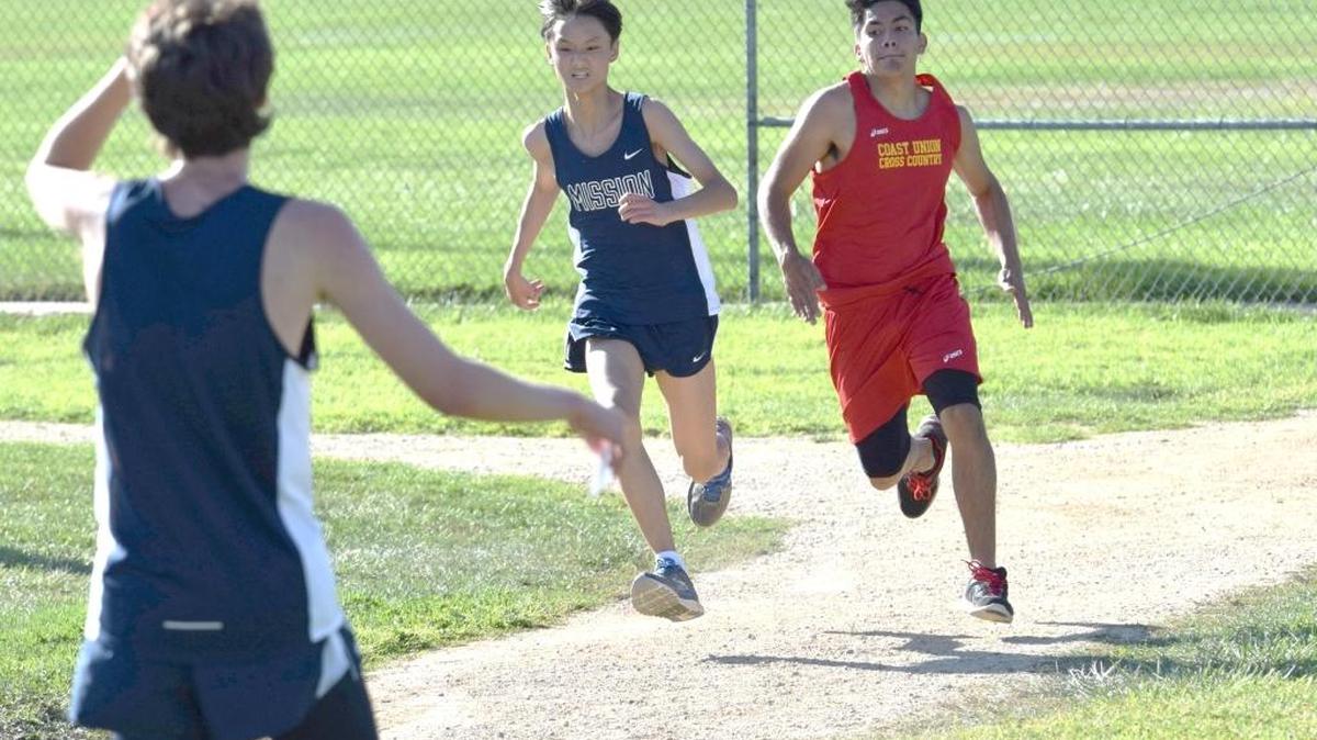 Diego Leonardo finished 10th in 21:37 for Coast Union in a Sept. 27 cross country meet against Mission Prep. Here he goes into an aggressive surge to pass the Mission Prep runner to his right.