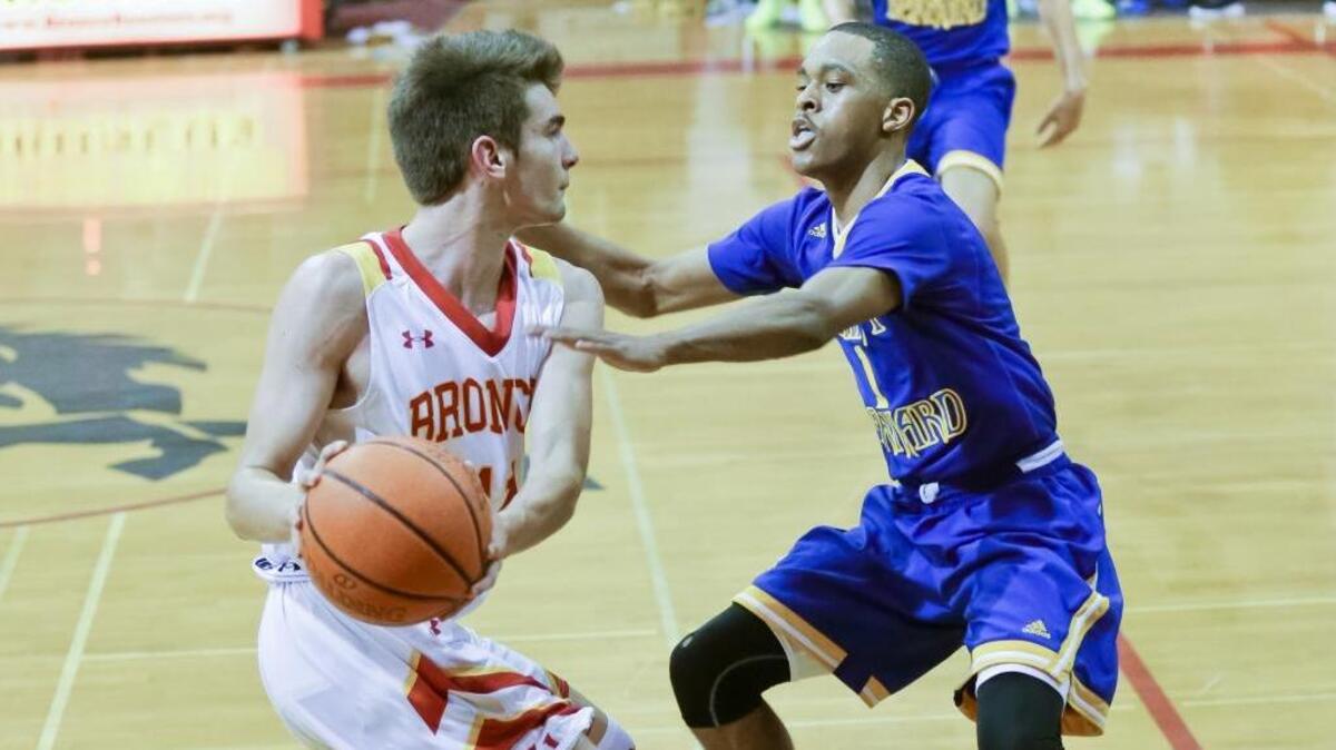 Jez Lawson is guarded very aggressively by a St. Bernard defender in Friday night’s playoff loss at Coast Union.