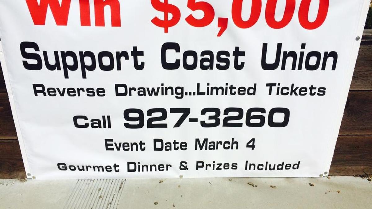 A poster advertising the reverse drawing is tacked to a board at the north end of Main Street in Cambria.