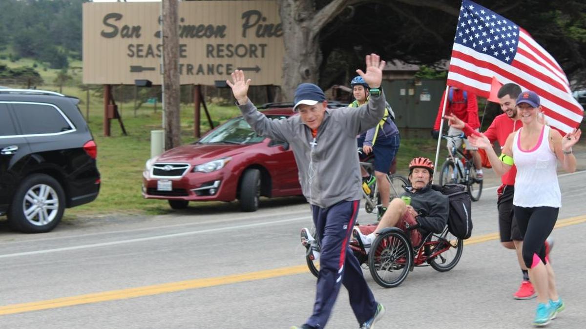 Steve Kniffen and his companions on a 100-mile trek pass by San Simeon Pines Resort about 7:25 a.m. April 21.