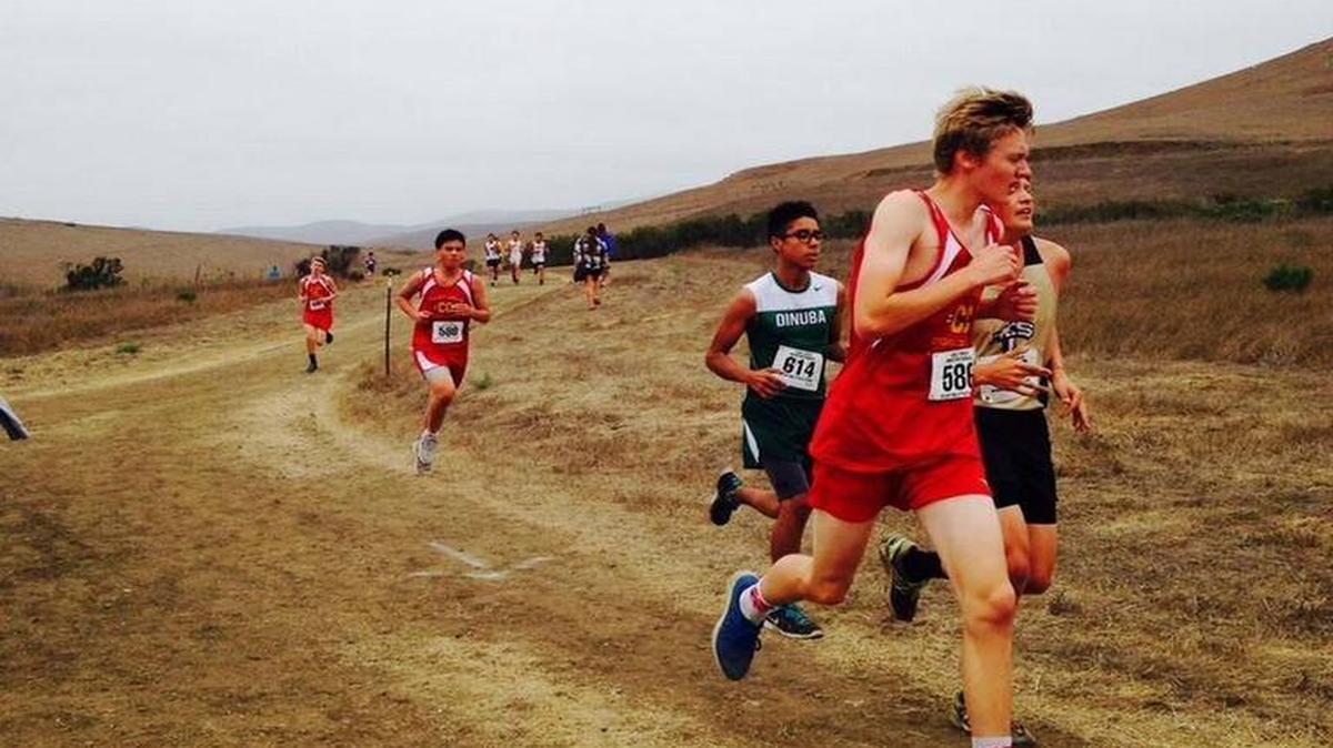 Junior cross country runner Nic Roper was given the Coach’s Award for his outstanding performance this season. Here, he runs in the Cal Poly Invitational on Oct. 16, placing second behind Paul Butterfield.
