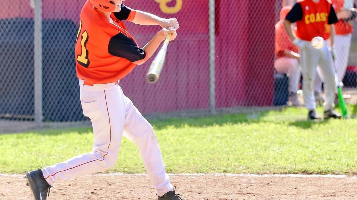 Freshman outfielder Nate Markham takes a cut against Avenal on Friday, March 17, his first plate appearance as a varsity player at Coast.