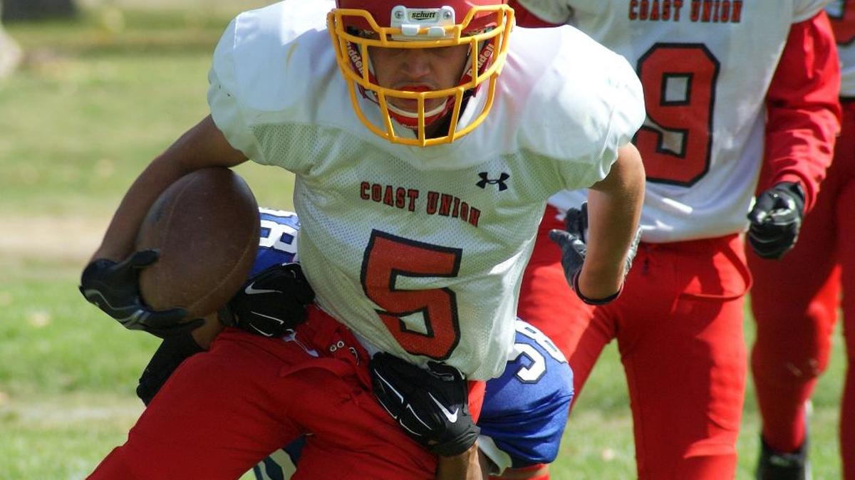 Coast Union running back Juan Meja fights for some of his 183 yards against Shandon on Saturday, Oct. 22.