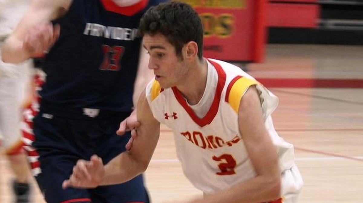Sophomore David Amodei led Bronco scorers with three 3-pointers in Coast Union’s 34-27 win over Shandon on Jan. 9. Here Amodei controls the ball against Providence earlier in January.