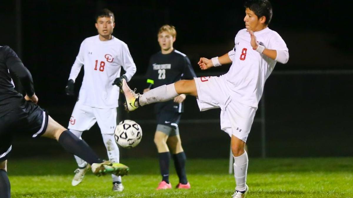 Junior Daniel Pena scored one of the two goals for Coast Union against the Paso Robles freshman team Friday, Jan. 27. Here he battles in an earlier match this season.