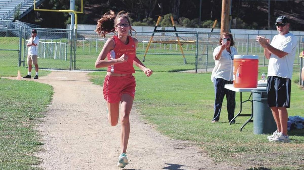 Sophomore Isabella Raethke is participating in the Coast Union cross country team’s summer training program. Here she places second in the girls portion of Coast’s dual meet against Santa Maria in September 2015.