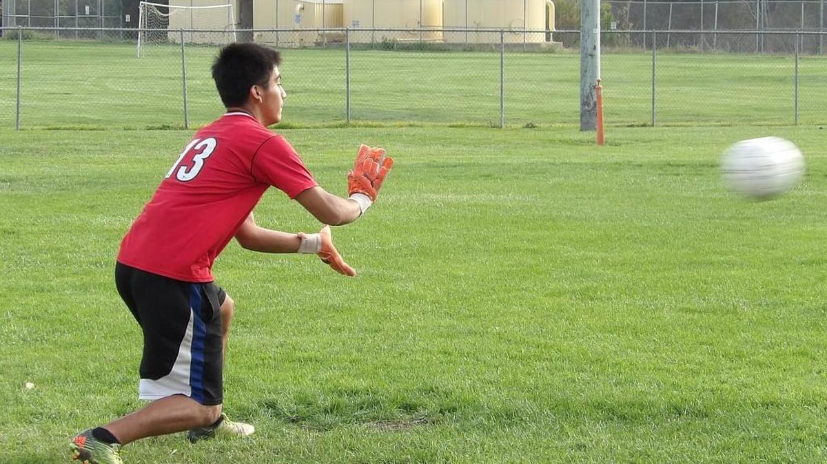 Coast Union goalkeeper Diego Leonardo practices the skills needed to correctly handle attempted scoring shots Friday, Nov. 11.