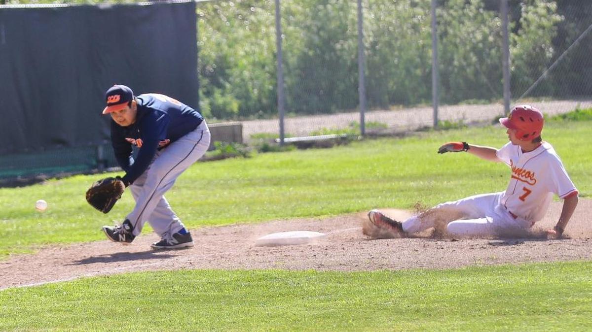 Broncos pitcher Chase Volz slides in safely at third base during Coast Union’s 12-0 win over Santa Clarita International on May 20.