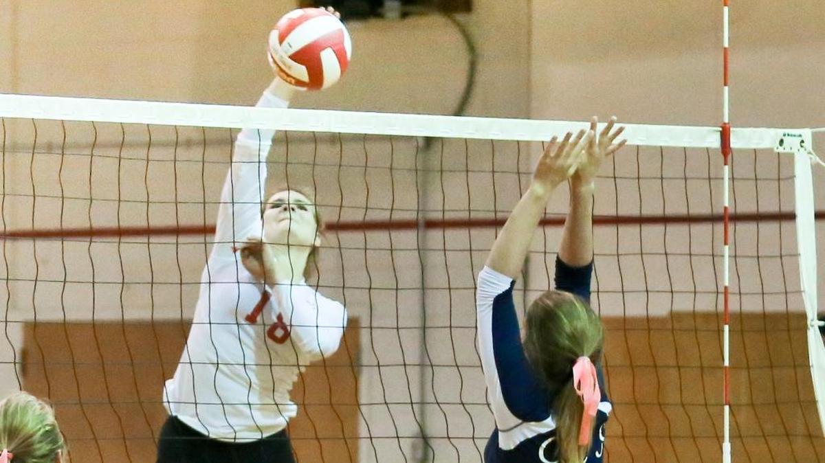 Coast Union standout Gigi Stoothoff slams the ball back to the alumni team during the varsity-alumni fundraiser Friday, Oct. 21.