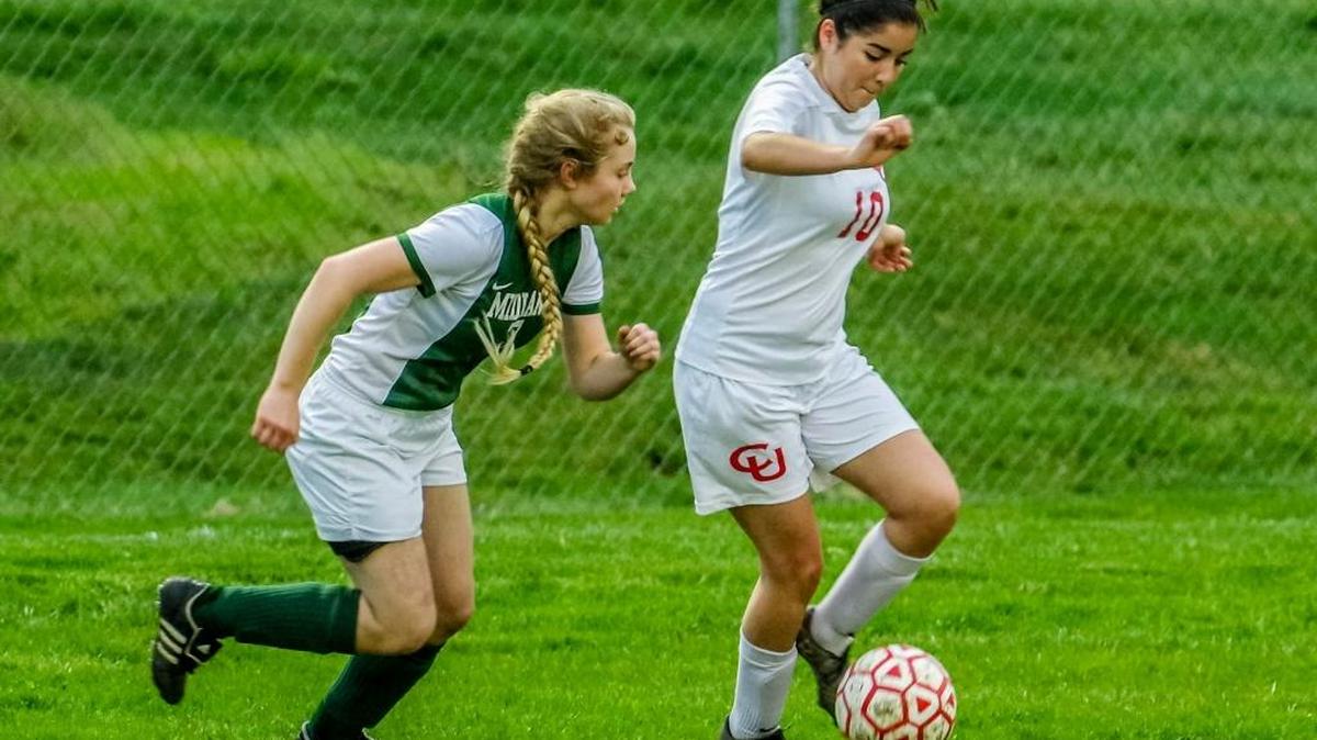 Senior Paulina Torres, the Lady Broncos’ captain, battles for control of the ball against Midland on Friday, Jan. 29. Coast won, 2-1.