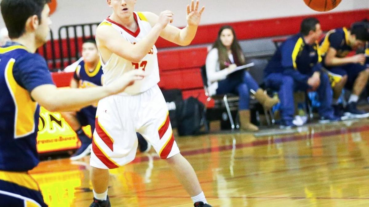 Junior Riley Kennedy had 10 points and five rebounds on Friday, Jan. 27 against Maricopa. Crisp passing is a hallmark of Bronco varsity basketball; here Kennedy passes during an earlier game this season.