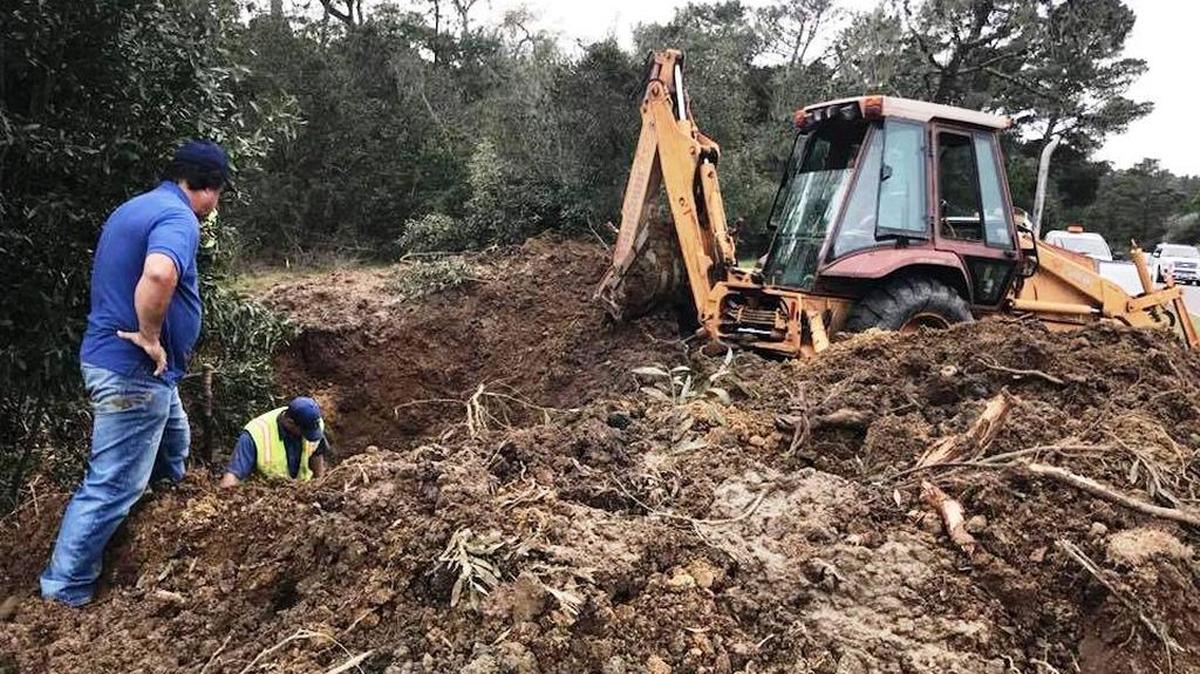 Cambria Community Services District repair crews work stopped a pipe leak at Burton Drive and Highway 1 on Monday, Jan. 29.