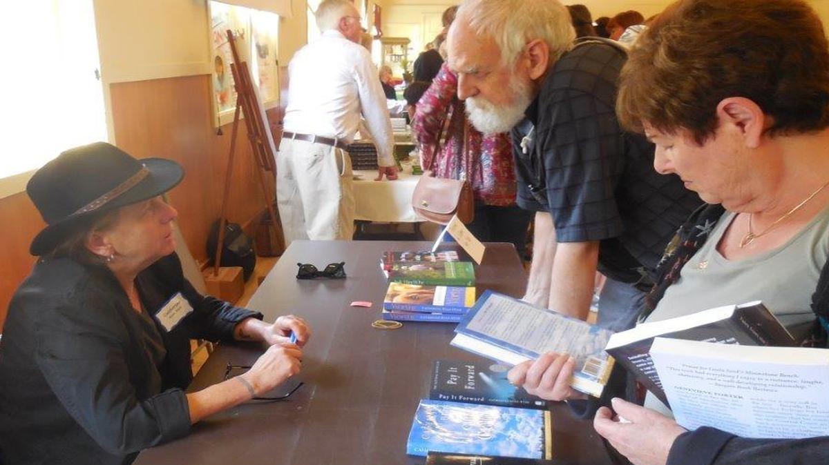 Sharon Lovejoy and Catherine Ryan Hyde were the featured guests at the Cambria Celebration of Authors, which included a wide range of fiction and non-fiction writers who contributed a substantial percentage of their proceeds to the Historical Society Operations Fund. Hyde, seated here, “paid it forward” by donating 100 percent of her sales for the day