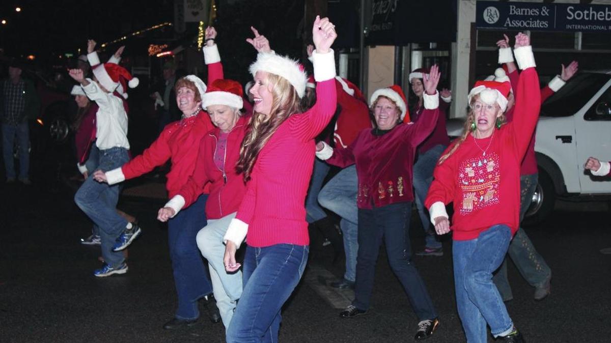Flash-mob dancers kick up their heels to “Jingle Bell Rock” on Hospitality Night in the West Village in 2014.