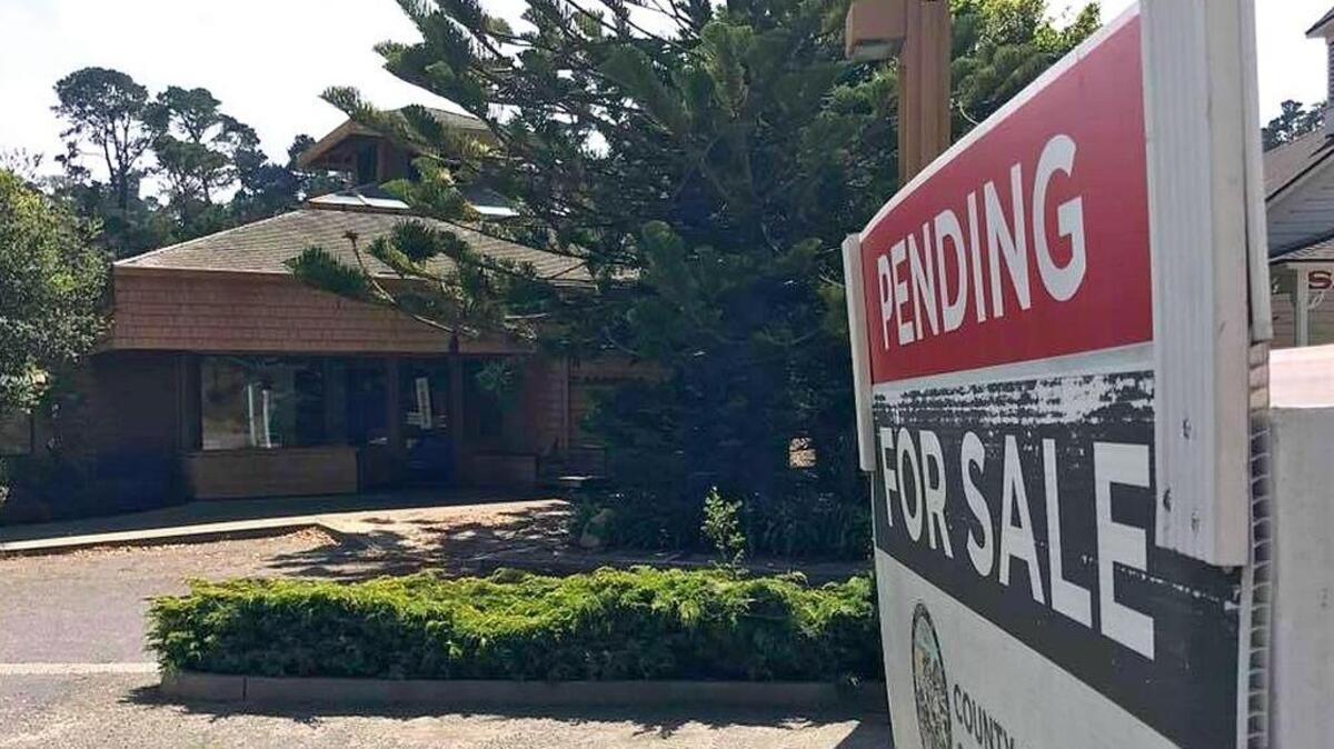 A “sale pending” sign sits in front of the old Cambria library, which the Cambria Community Services District board agreed to purchase Thursday, July 27, as the new site for its offices.