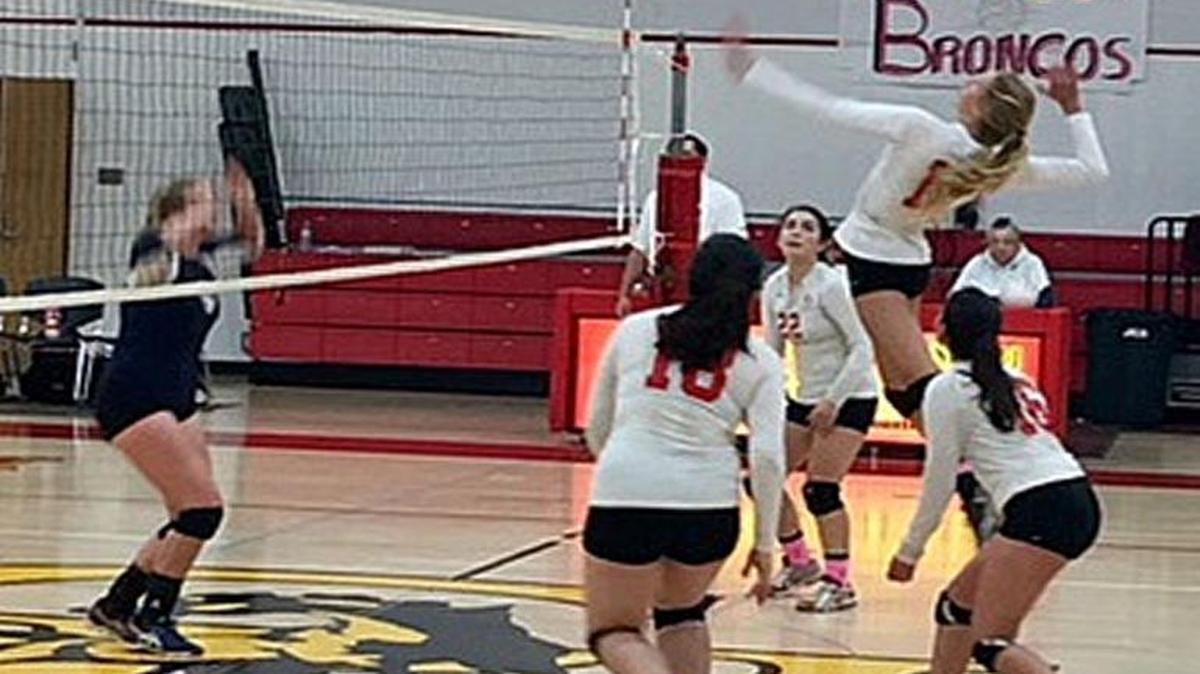 Karis Lawson of Coast Union gets ready to hammer the ball over the net during a Coast Valley League volleyball showdown with Oct. 3 against the Coastal Christian Conquerors. Coast Union won in five games to take sole possession of first place in league play at 5-0.