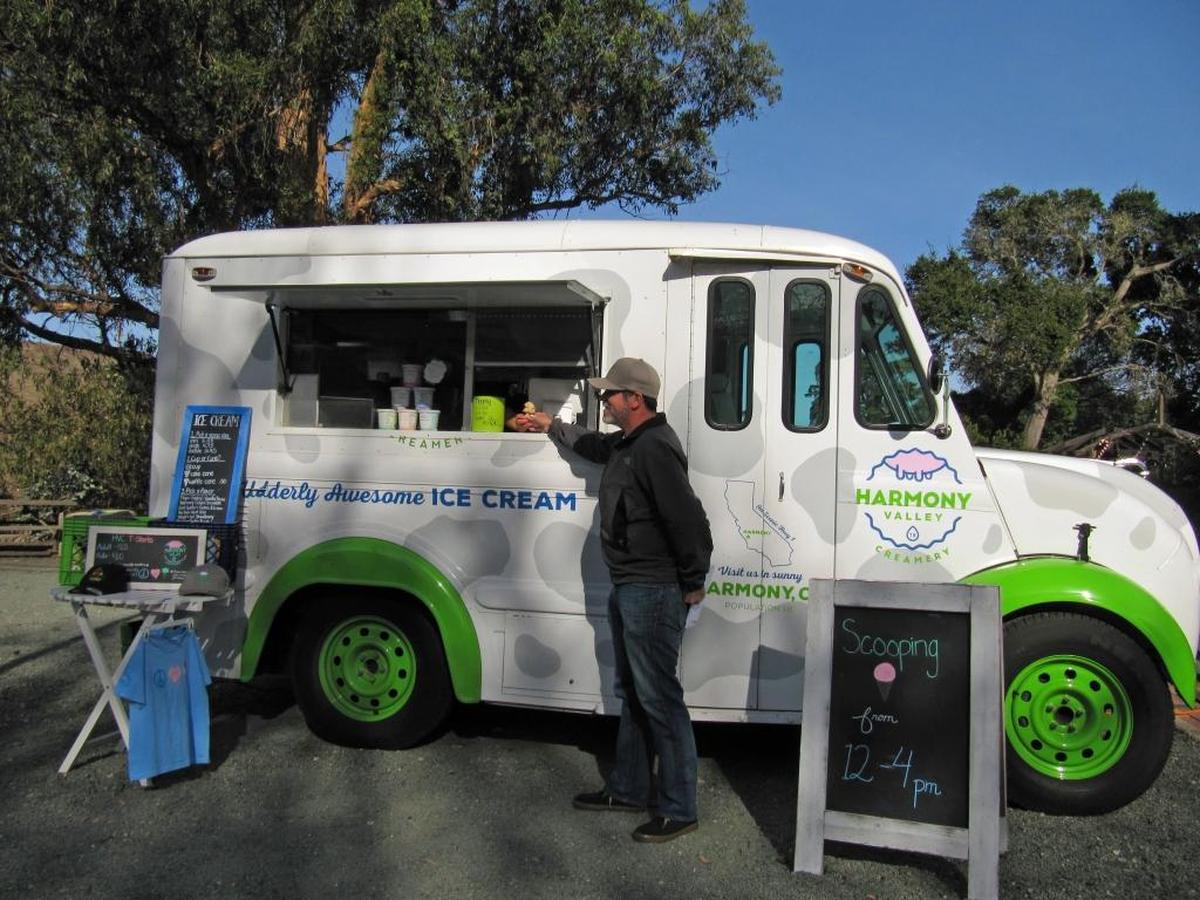 Tom Halen enjoys a coffee-flavored cone served up from one of Harmony’s two ice cream trucks.
