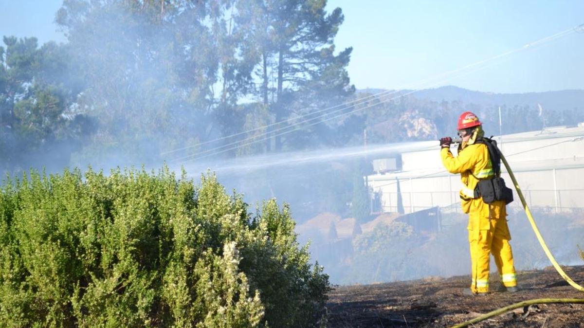 Cambria Fire Capt. Jonathan Gibson fights a fire near Santa Lucia Middle School in October. Gibson is one of three fire captains being considered for internal promotion to chief.
