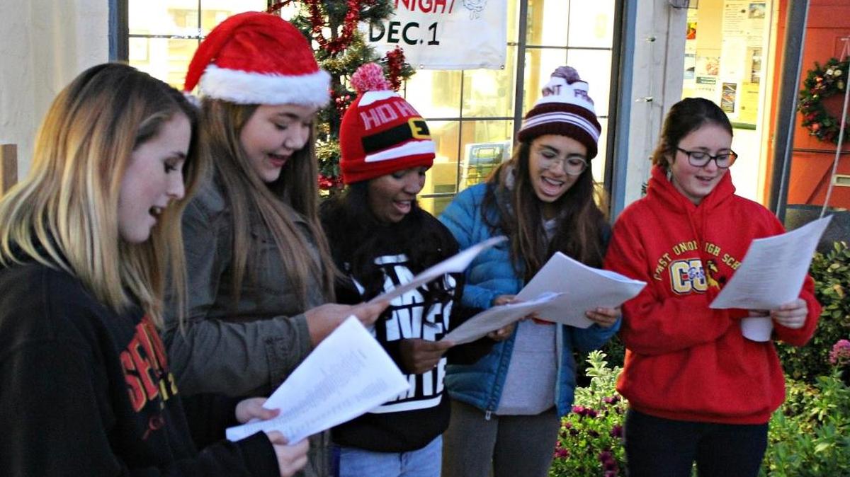 Carolers from Coast Union High School sing outside the Cambria Chamber of Commerce on Hospitality Night.