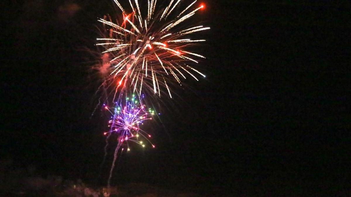 Fireworks explode over Moonstone Beach in a view from the Santa Rosa Creek overlook.