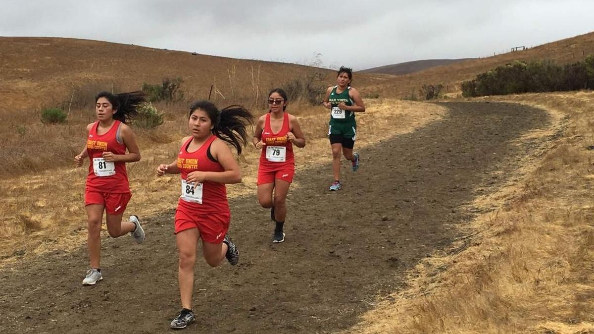 Coast Union runners Sujey Gutierrez (81), Maria Ramirez (84) and Maria Castillo (79) ran in the Cal Poly Invitational on Saturday, Oct. 15.