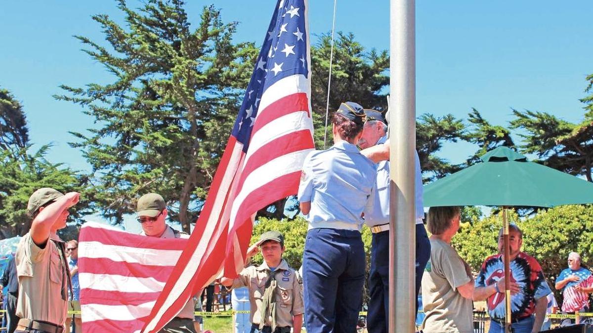 The American Flag is raised during 2015 Independence Day festivities at Shamel Park in Cambria.