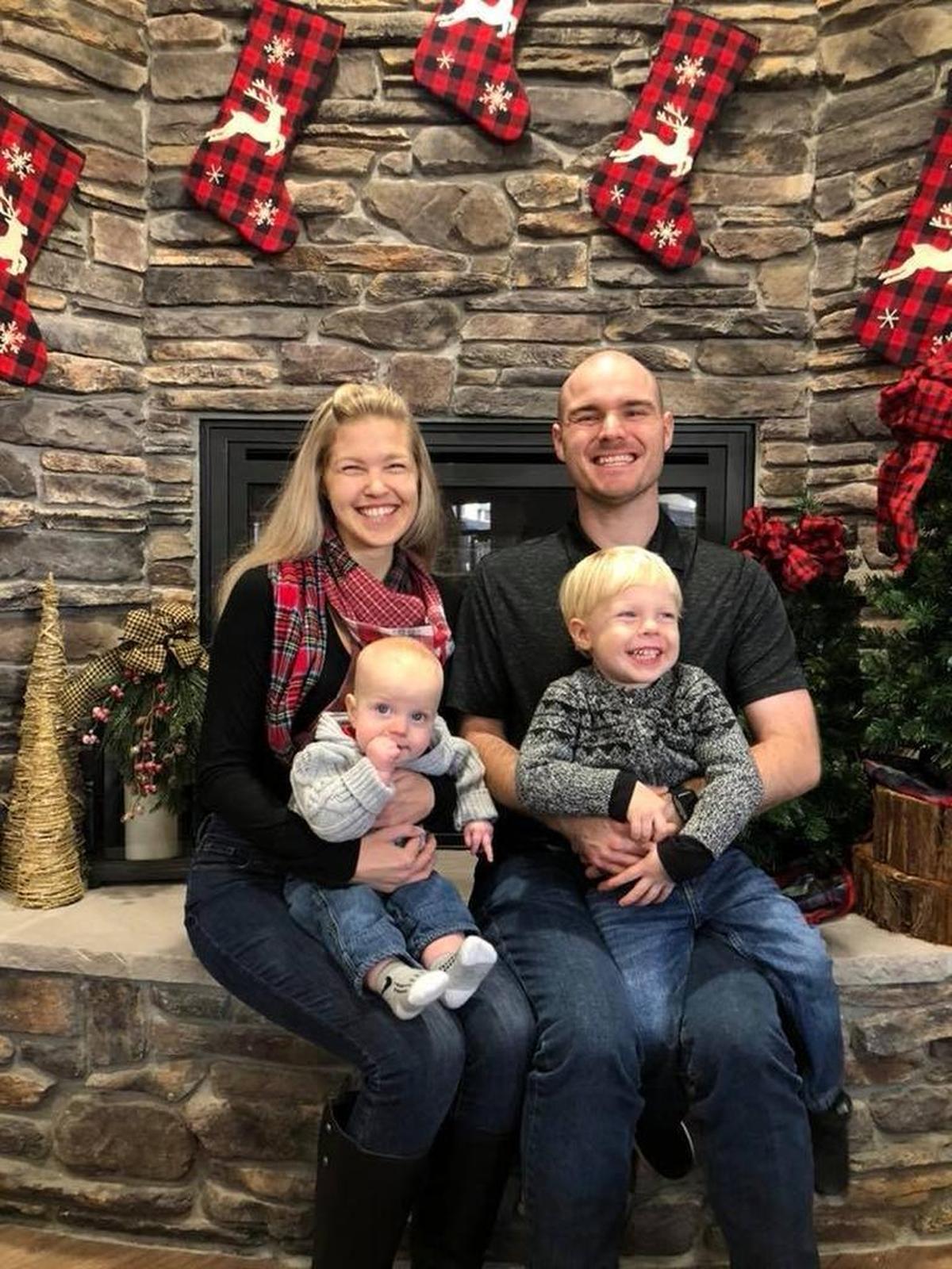 Melissa Moore with husband Chris and sons Oliver and DJ.