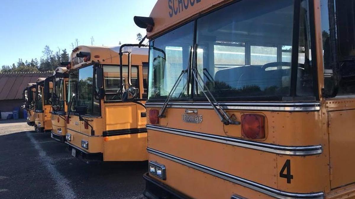 School buses are parked in the district transportation area at Coast Union High School on Wednesday, Oct. 25.