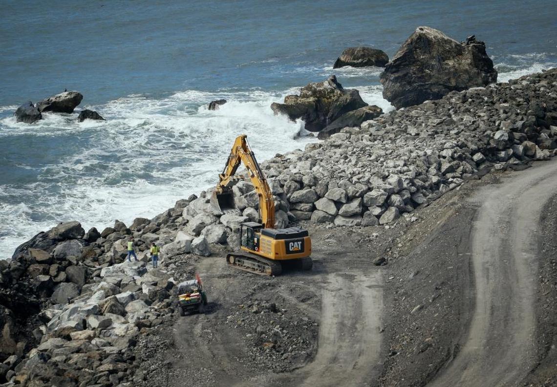 Crews work to finish up the massive seawall at the base of the Mud Creek Slide on the Big Sur Coast of California.