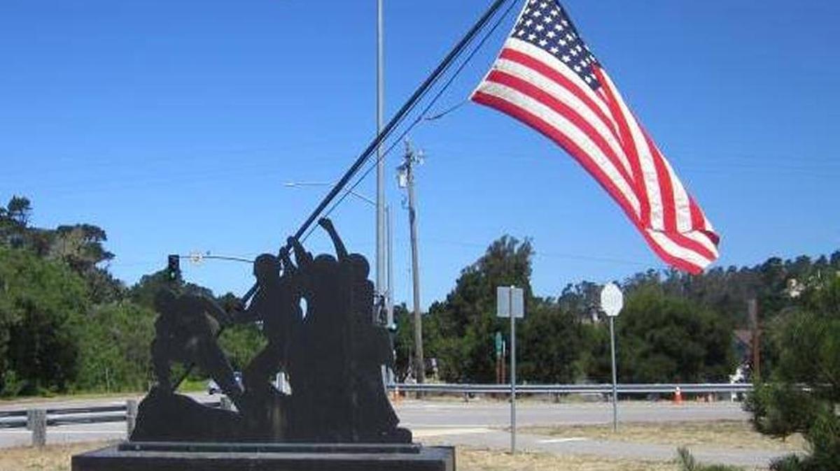 A statue reproducing the iconic 1945 photo of Marines raising the U.S. flag during the battle of Iwo Jima stands near Rabobank in Cambria. The statue, created by Cambria veteran Jay Burbank, was placed there just in time for Independence Day.