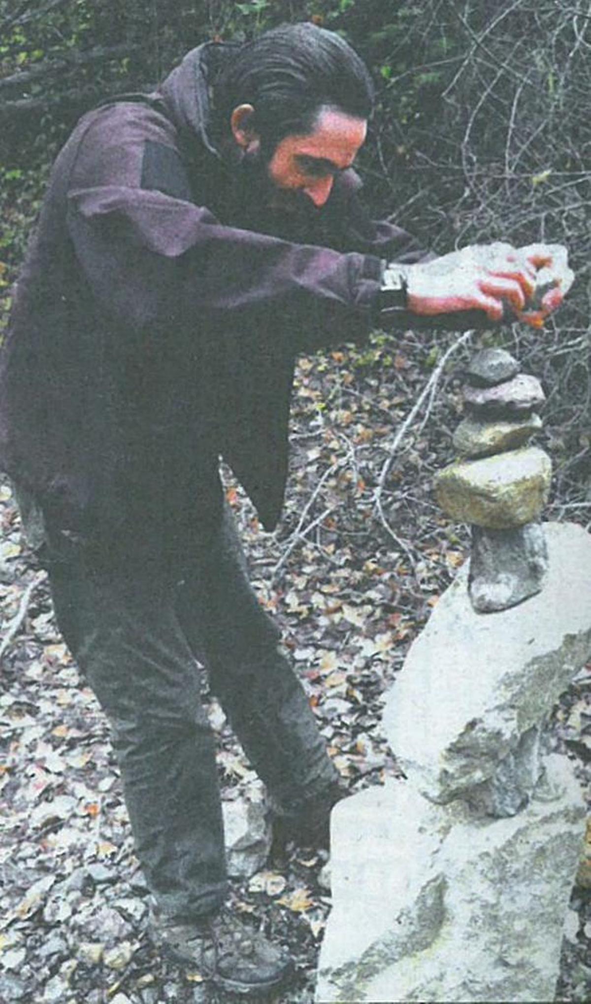 Kellen Trimble creates a cairn in 2014.