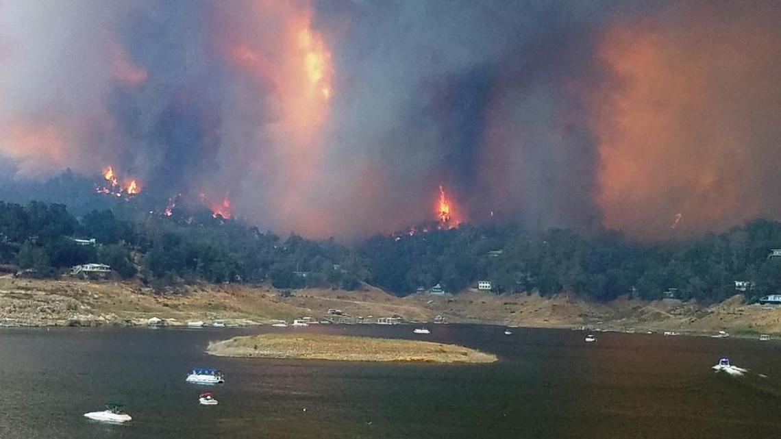 The Chimney Fire rages along the shore of Nacimiento Lake in this photo taken from Oak Shores, across from Cal Shasta, over the weekend.