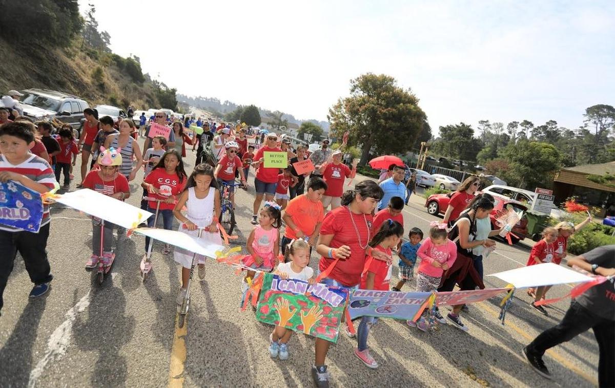 Cambria Grammar School kids and teachers make their way down Main Street during last year’s Pinedorado Parade in Cambria.