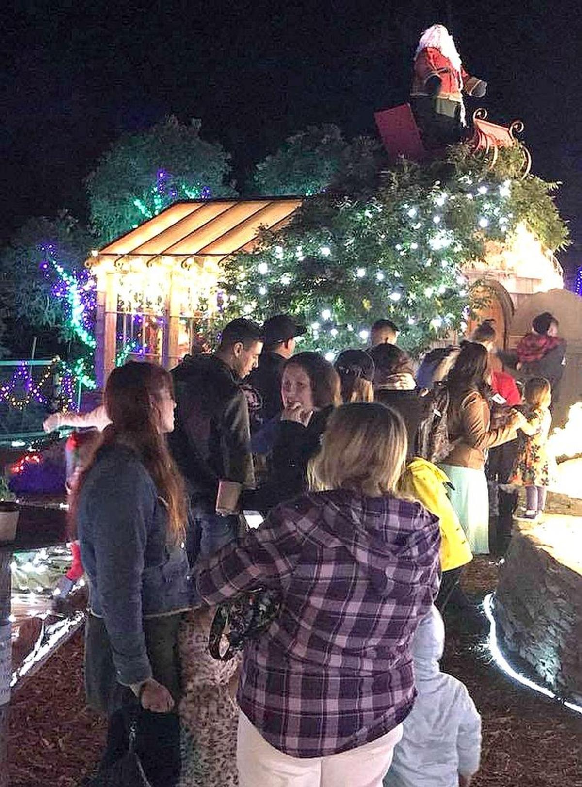 Visitors to the Cambria Christmas Market wait for a visit with Santa earlier this month.
