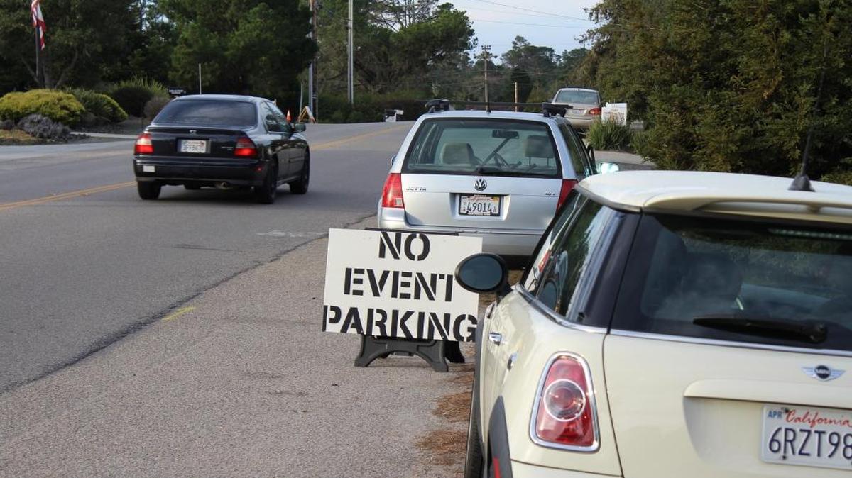 “No event parking” signs lined Burton Drive as part of an agreement between the Cambria Christmas Market and the Coastal Commission, but neighborhood residents remain concerned about the noise and exhaust caused by buses shuttling visitors to and from the event.