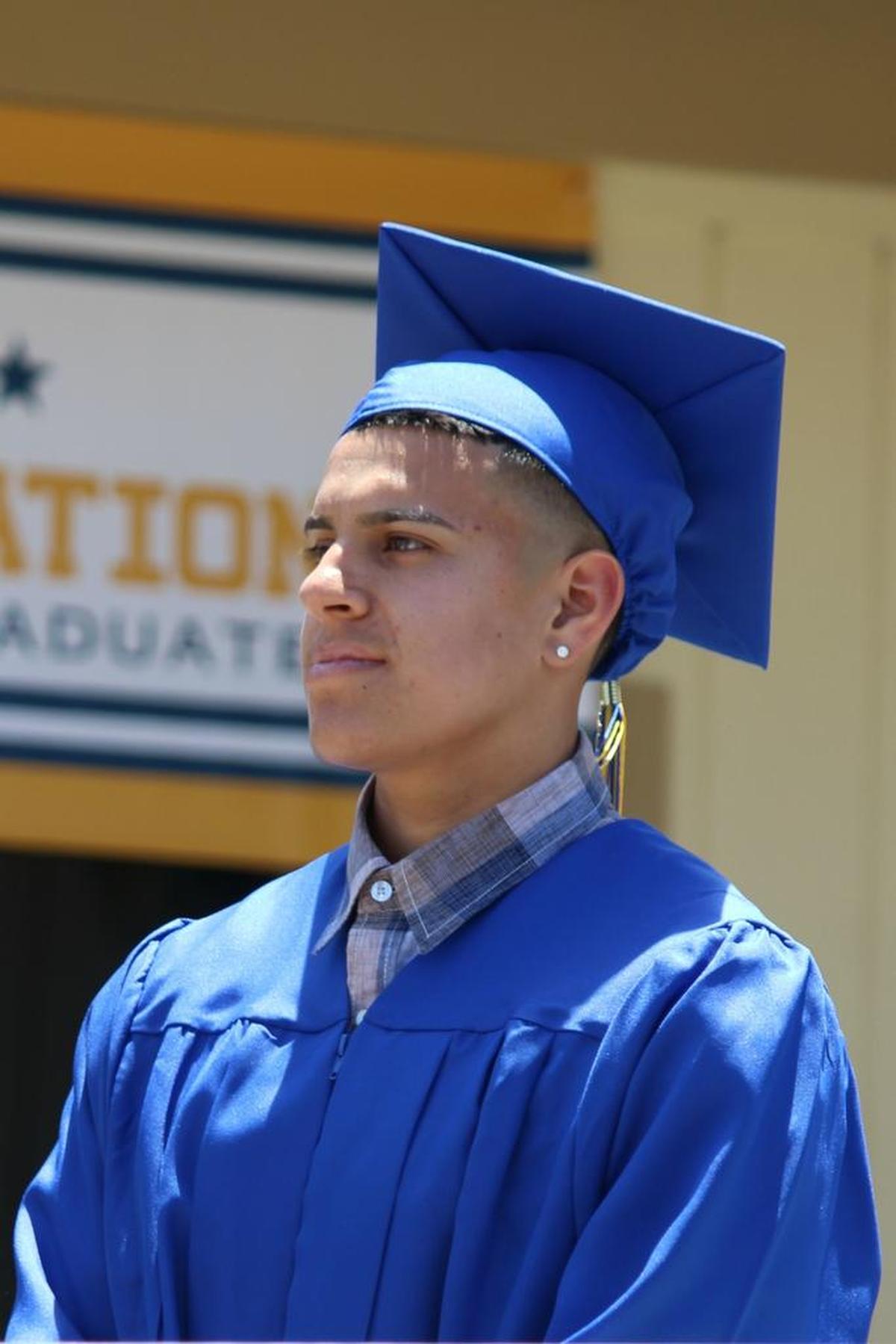 Jose Fernandez waits to receive his Leffingwell High diploma Thursday.