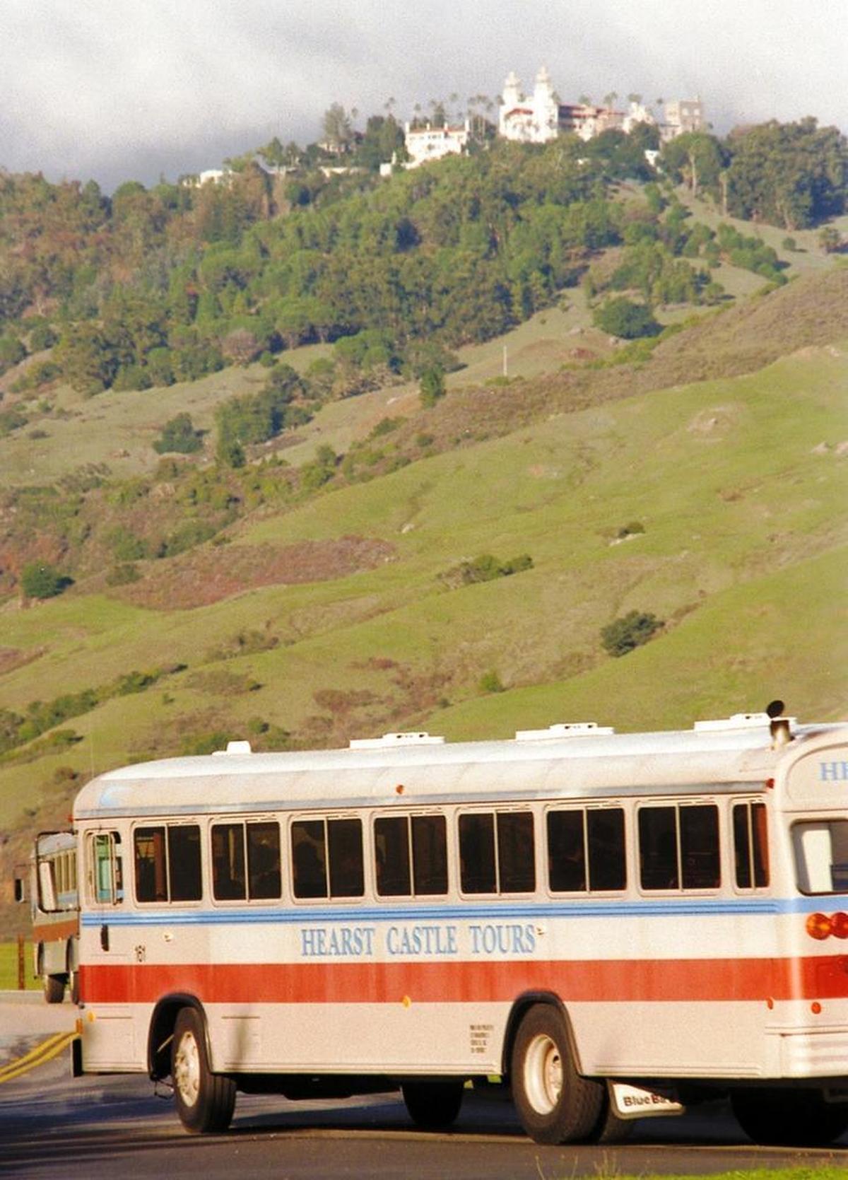 A bus carries tourists up to Hearst Castle in this photo from 2002. Attendance at the Castle during the first week of July this year was down 7.75 percent from last year.