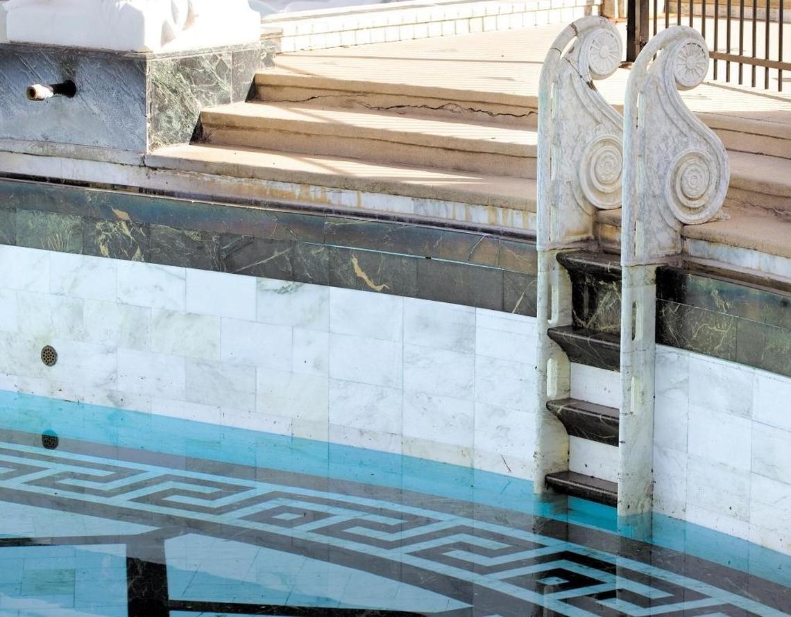 Even something as simple-sounding as resetting the steps (the side-mounted ladders that swimmers climb to get out of the pool) is tremendously complex. Here, as the pool was being drained in 2014, the shallow end is below the ladder.
