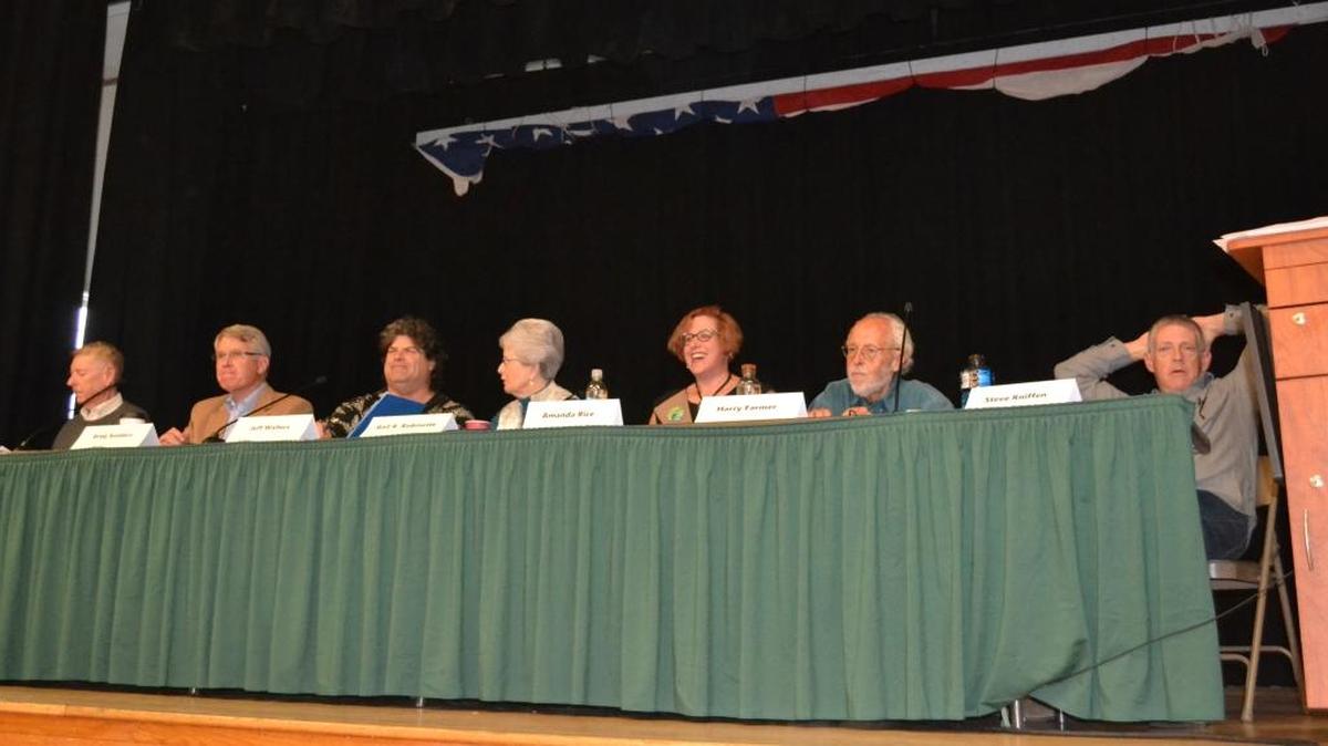 From left, candidates Dewayne Lee, appointed incumbent Greg Sanders, Jeff Walters, Board President Gail Robinette, incumbent Amanda Rice, Harry Farmer and write-in Stephen Kniffen appear at a League of Women Voters forum earlier this month. Tom Kirkey was unable to attend because of illness.