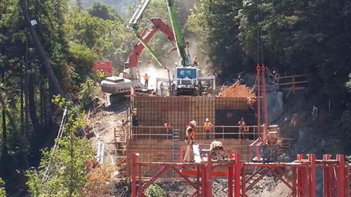 Work is being done on a “wing wall” for the launch tower at the site of the new Pfeiffer Canyon Bridge.