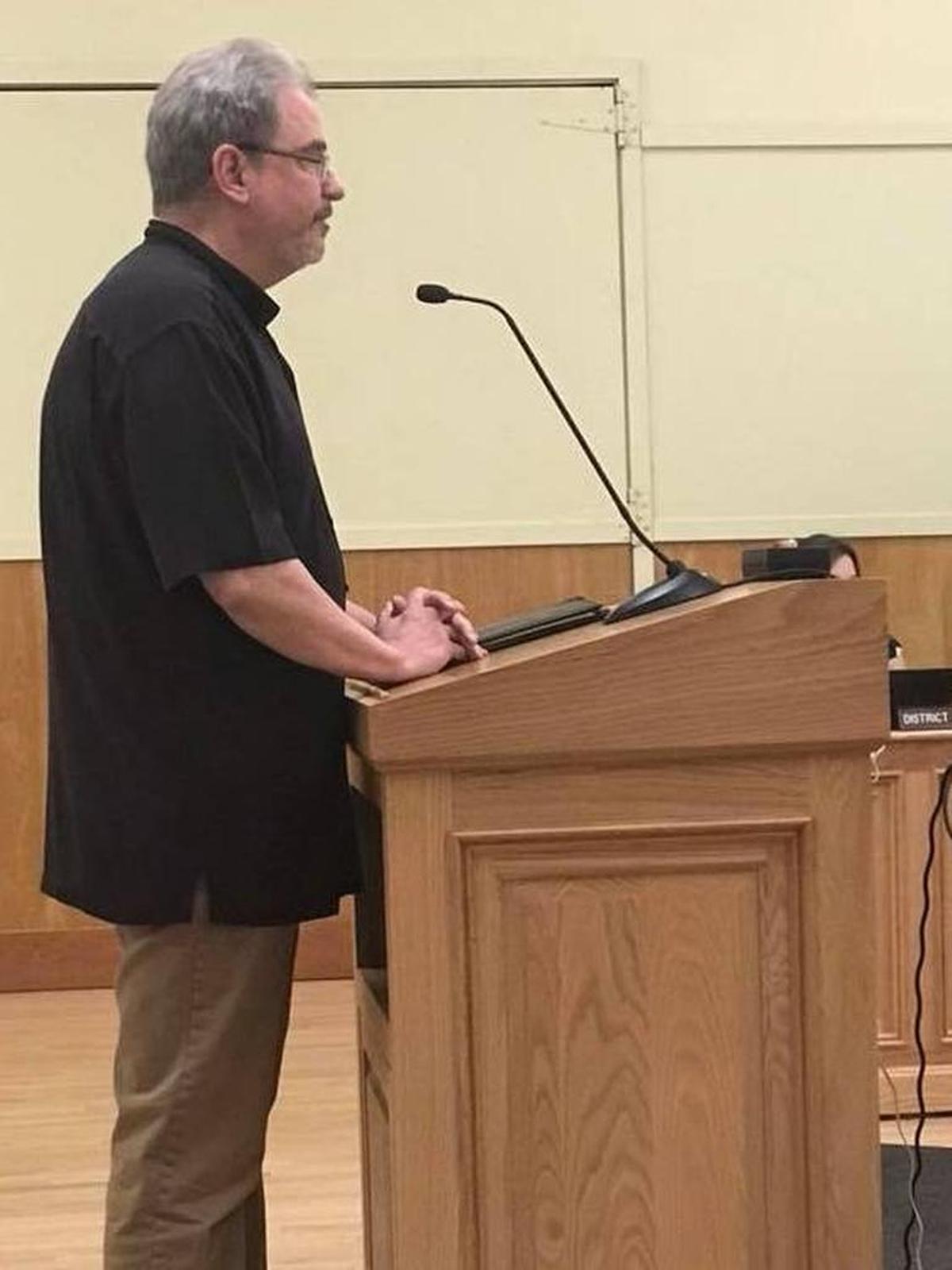 Applicant Mark Herrier answers questions from CCSD directors Monday.