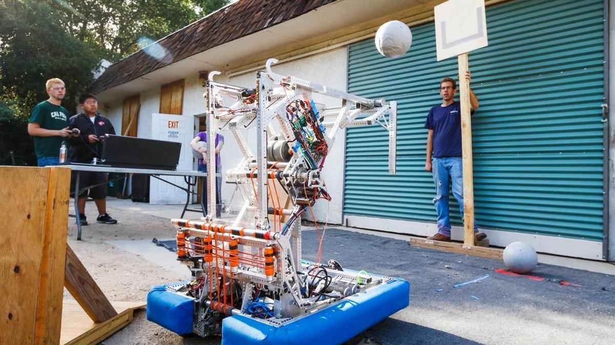 Members of Atascadero High School’s robotics team and their mentors demonstrated the abilities of their practice robot as they prepared to head to the World Championships in St. Louis in April.