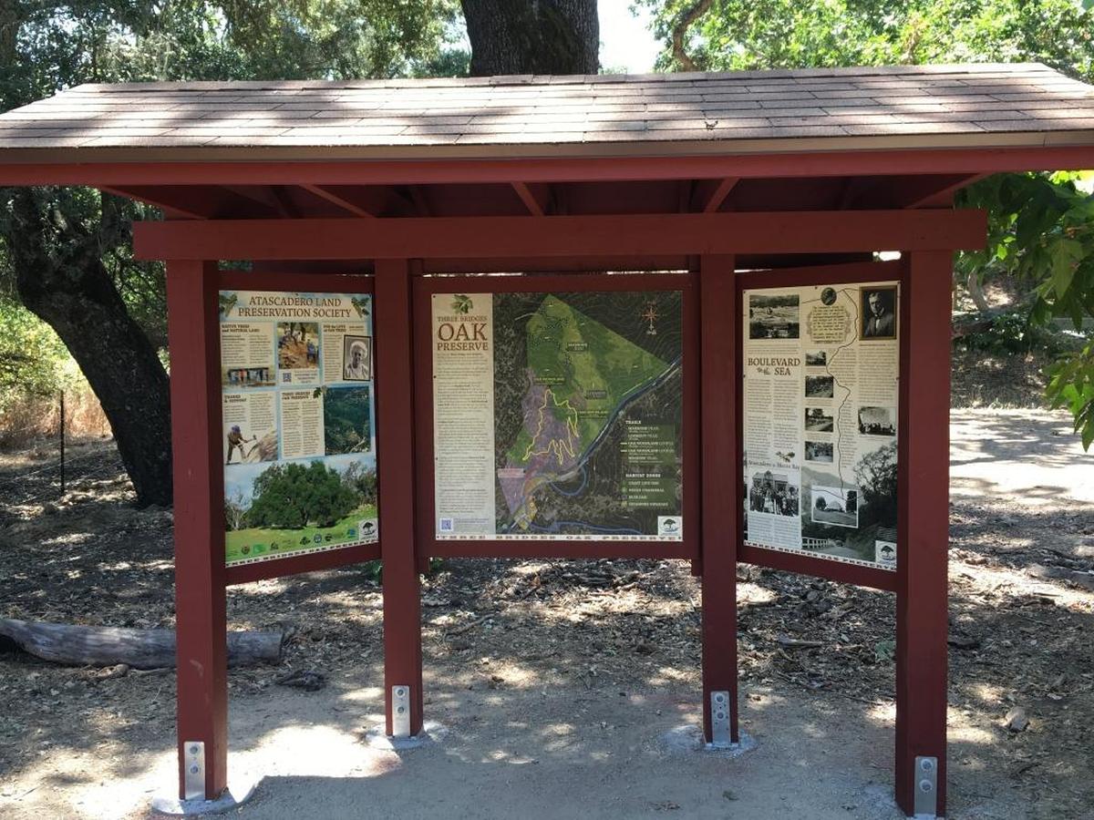 Information and a detailed map are part of the Three Bridges Oak Preserve trailhead. Each of the five trails are well maintained, and there's tree cover all the way to the summit.