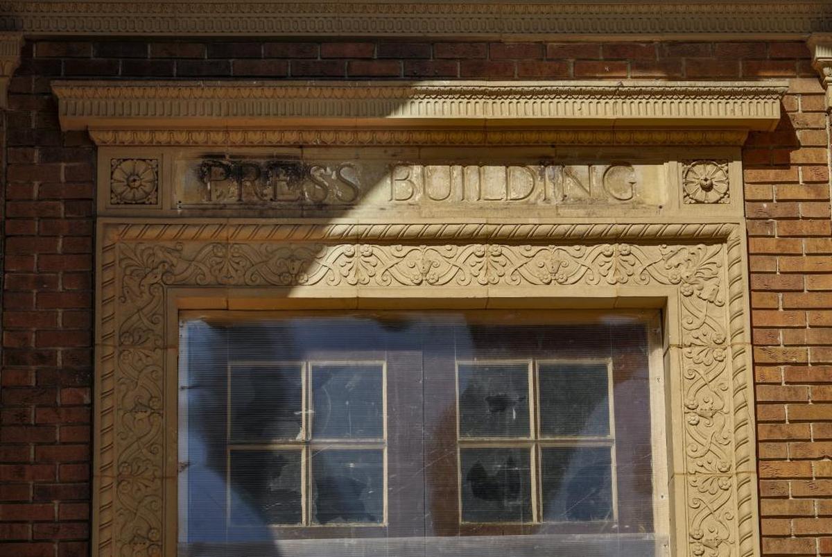 The removal of an old sign at Atascadero’s Printery revealed the engraving “Press Building” underneath.