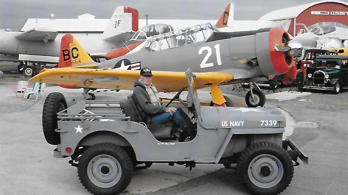 Lon Allan drives his 1946 Willys jeep at the Estrella Warbirds Museum car show on Saturday in Paso Robles.