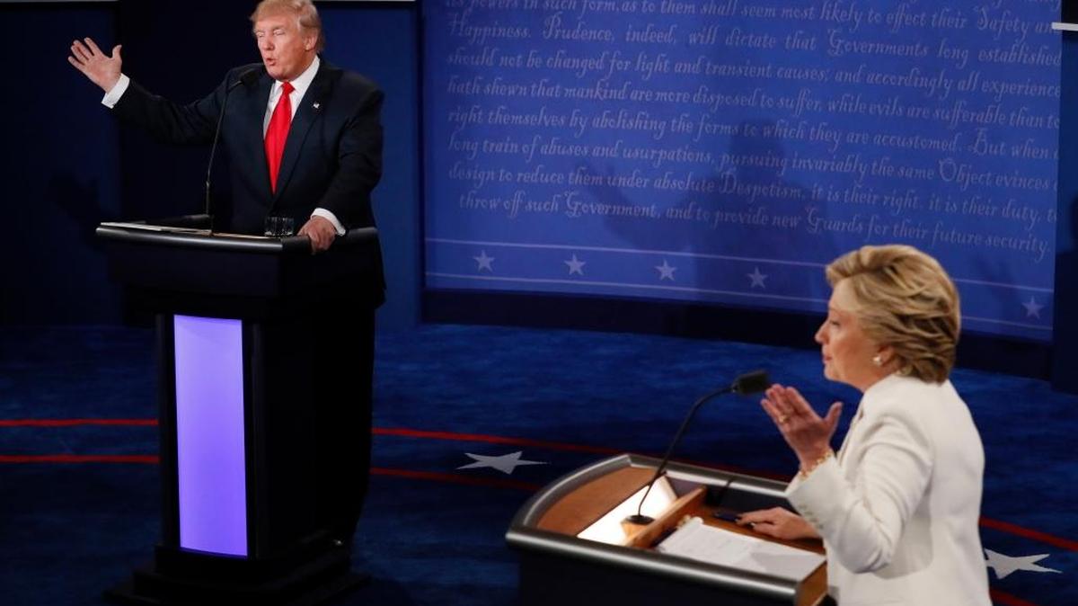 Democratic presidential nominee Hillary Clinton and Republican presidential nominee Donald Trump debate Wednesday during the third presidential debate at UNLV in Las Vegas.
